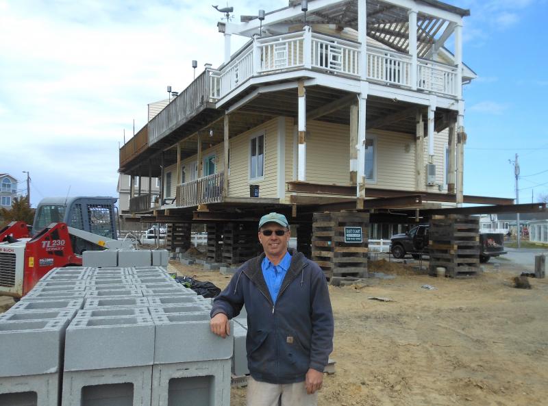 John Davidson in front of a house that he and he crew are working on in Dewey Beach. CHRIS FLOOD PHOTO
